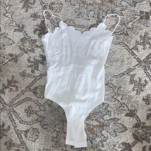 Bodysuit with open back and lace